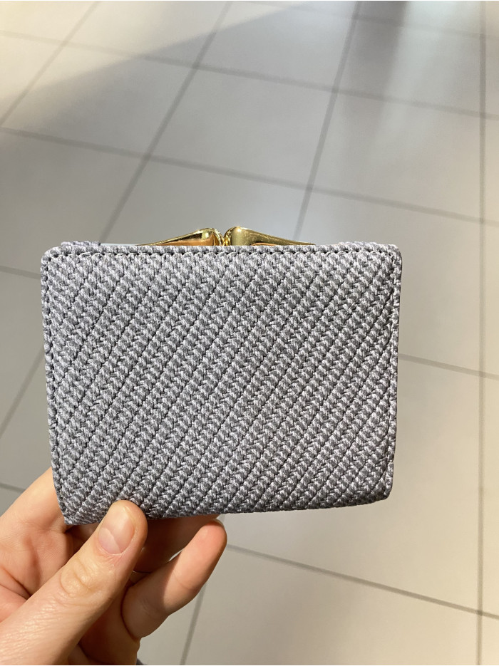 Жіночий гаманець плетений блакитний